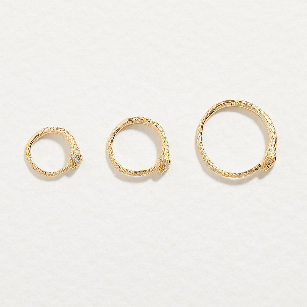 11mm Serpent Clicker by Pamela Love – Piercing in #product_material# (#product_color#). 11mm-serpent-clicker