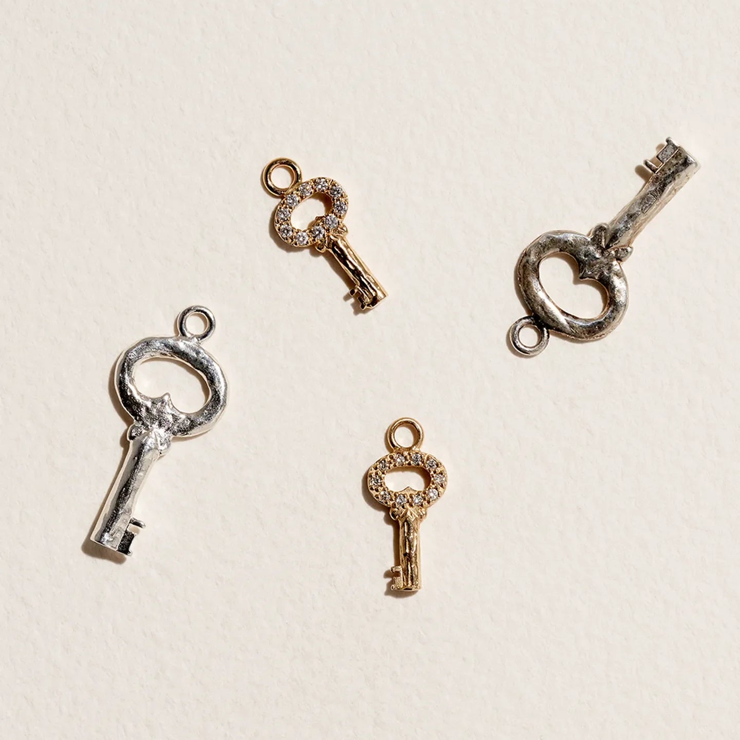Fini’s Key Charm by Pamela Love – Charm in #product_material# (#product_color#).  fini-s-key-charm-gold-diamond-white