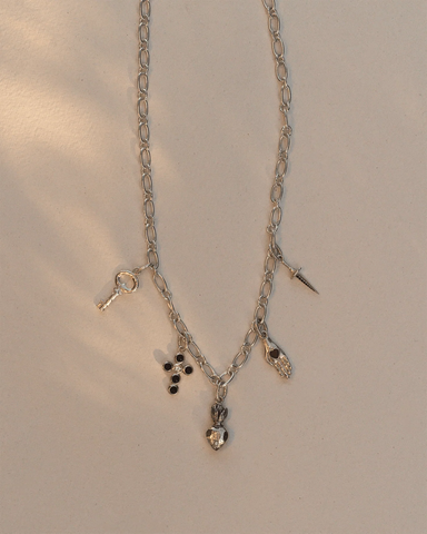 Fini’s Key Charm