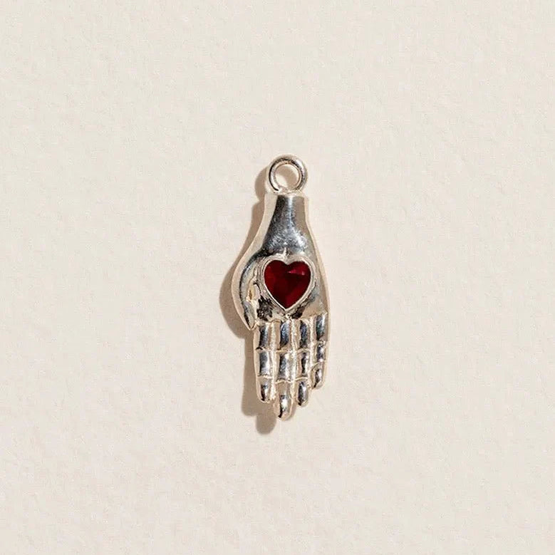 Heart in Hand Charm by Pamela Love – Charm in #product_material# (#product_color#).  heart-in-hand-charm-sterling-silver-glass-red