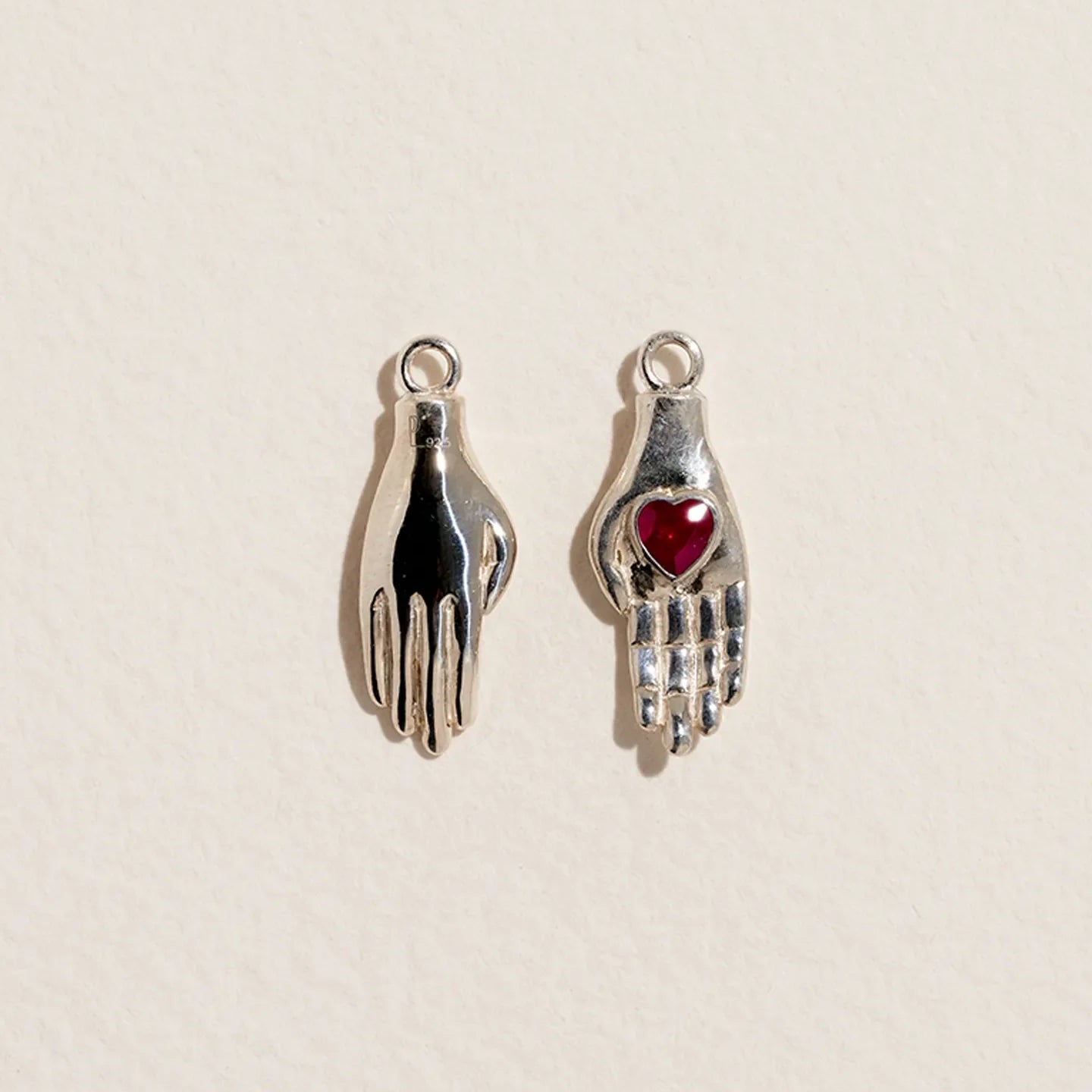 Heart in Hand Charm by Pamela Love – Charm in #product_material# (#product_color#).  heart-in-hand-charm-sterling-silver-glass-red