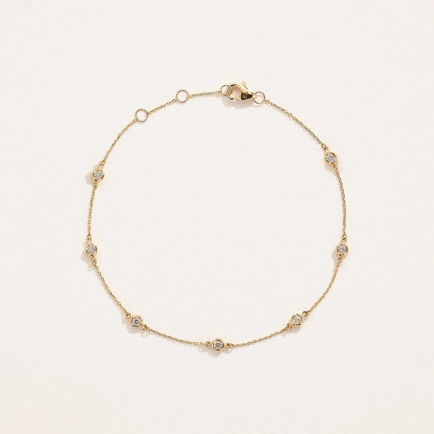 Molten Anklet by Pamela Love – Anklets in #product_material# (#product_color#).  molten-bezel-station-anklet-gold-diamond-white